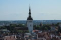 View of the roofs of old Tallinn and medieval church Royalty Free Stock Photo