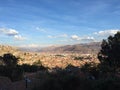 View of the rooftops of Cusco, Peru with the Andes mountains in the background Royalty Free Stock Photo