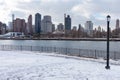 Roosevelt Island and Manhattan Skyline along the East River seen from Rainey Park covered in Snow in Astoria Queens New York durin Royalty Free Stock Photo