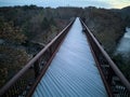 view of rosendale trestle passing over rondout creek at dusk (sunset, low light) old railroad bridge converted to bike