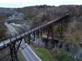 view of rosendale trestle passing over rondout creek at dusk (sunset, low light) old railroad bridge converted to bike