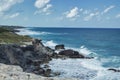 A view of rough sea water splashing against the rocks in Isla isla mujeres near Cancun, Mexico Royalty Free Stock Photo