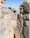 View of the round tower through the loophole of the middle tower of the western wall of Nimrod Fortress located in Upper Galilee Royalty Free Stock Photo