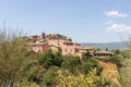 The small village of Roussillon. Landscape with houses in historic ocher town Roussillon, Provence, France Royalty Free Stock Photo