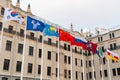 Flags of various states on the background of the building Royalty Free Stock Photo