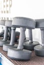 View of rows of dumbbells on a rack