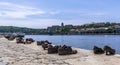 A view of the Royal Palace in Budapest with a reminder of the holocaust victims on the banks of the River Danube Royalty Free Stock Photo