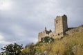 View of the Ruins of the Mausoleum of Tredolice. Medieval Castle on a Rock on a Cloudy day in Calabria Region, Italy