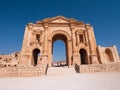 View of ruins of an old city, famous triumphal Hadrian's Arch - an ancient Roman structure in Jerash Royalty Free Stock Photo