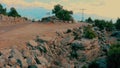 View of rural road with big stones on a summer sunny day. Royalty Free Stock Photo