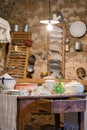 View of a rustic table with old kitchenware in a Catalan farmhouse Royalty Free Stock Photo