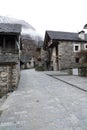 View of a rustic traditional mountain town in the Alps of southern Switzerland Royalty Free Stock Photo