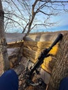 A Crossbow Resting in a Wooden Tree Stand Royalty Free Stock Photo
