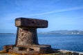 View of rusty dock bollard in the pier