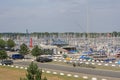 View sailboats docked at the pier viewed from University of Kiel Sailing Center in summer