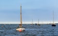 A view of sailing boats moored in the estuary of the River Glaven, Norfolk, UK