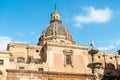 View of Saint Catherine church dome with the marble statue of the Pretoria fountain ahead, Palermo Royalty Free Stock Photo
