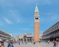 View of Saint Mark Square with tourists on summer day. Dodge Palace, Campanile on Piazza San Marco, Venice, Italy Royalty Free Stock Photo