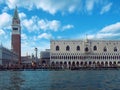 View of saint marks square cathedral and the doges palace in venice from the waterfront on a bright sunny day Royalty Free Stock Photo
