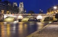 The view of Saint-Michel bridge and the Seine River at night, Paris, France Royalty Free Stock Photo