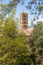 View of Saint Scholastica medieval monastery surrounded, by trees in Subiaco. Founded by Benedict of Nursia Royalty Free Stock Photo