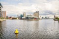 View of Salford quays in Manchester on a cloudy summer day