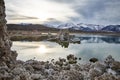 View of a Saline Soda Lake with Snow Capped Eastern Sierra Navada Mountains on a Cloudy Day in the Afternoon with Sunlight Shinnin Royalty Free Stock Photo