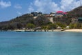 View of Salt Whistle Bay, Beach and Jetty with Boats and Palm Trees, Mayreau, Eastern Caribbean.