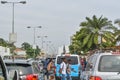 View of samba road in the city center with people, vehicles and buildings