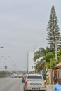 View of samba road in the city center with people, vehicles and buildings