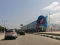 View of samba road in the Luanda city downtown center with people, vehicles and buildings