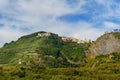 View of San Bernardino village on the top of hills. Cinque Terre. Italy