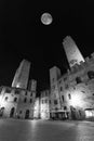 View of San Gimignano towers in Tuscany by night - Duomo square, in black and white Royalty Free Stock Photo