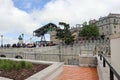 View of San Marino with crowds of tourists. Park and viewpoint at the top station of the cable car in San Marino