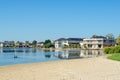 View of Sanctuary Lakes with some luxury waterfront houses in the distance. Royalty Free Stock Photo