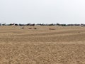 View of the sand along the coastline of bay of bengal with fishing boats, Marina Beach, Tamil Nadu, India Royalty Free Stock Photo