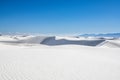 View of sand dunes and distant mountains in White Sands National Park