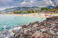 View on sandy beach in Alanya, Turkey. Cleopatra beach in Alanya. Turkish resorts. Summer vacation on mediterranean sea. Royalty Free Stock Photo