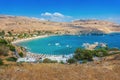 View of sandy beach in Bay of Lindos Rhodes, Greece Royalty Free Stock Photo