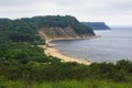 View of the sandy beach, cliffs and a beautiful cove Royalty Free Stock Photo