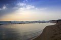 View of a sandy beach in a windy weather