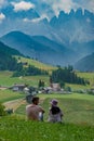 view of Santa Maddalena church in Dolomites, Italian Alps. Val Di Funes valley . Lonely church on green meadow on Royalty Free Stock Photo