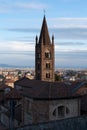 view of the Santa Maria church and bell tower in Rivoli historical city centre. Turin Piedmont Italy Royalty Free Stock Photo