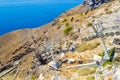 View of Santorini cable car moving down to the port at Caldera Fira Royalty Free Stock Photo