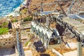 View of Santorini cable car moving down to the port at Caldera Fira Royalty Free Stock Photo