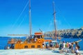 Tour boat at Thira Port pier at Santorini island Cyclades Greece