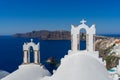 Santorini caldera with famous old white orthodox church Royalty Free Stock Photo