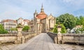 View at the Sao Goncalo monastery through the Old bridge over the river Tamega in Amarante ,Portugal