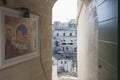 View of the Sassi of Matera through a door