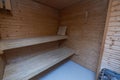 View of sauna room interior. Wooden walls and seats. Royalty Free Stock Photo